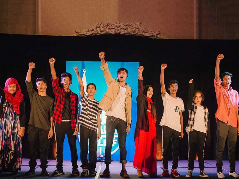 A scene from the play I Am Rohingya performed by Rohingya refugee youth in Kitchener, ON and directed by Yusuf Zine.