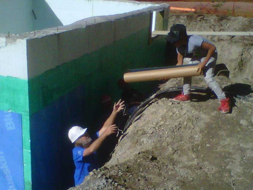 Habitat for Humanity volunteers work on a housing project.