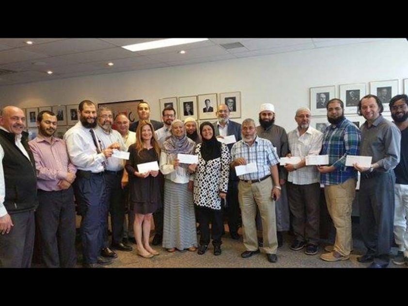 Members of the United Muslim Organizations of Ottawa-Gatineau delivering donations to Canadian Red Cross Headquarters