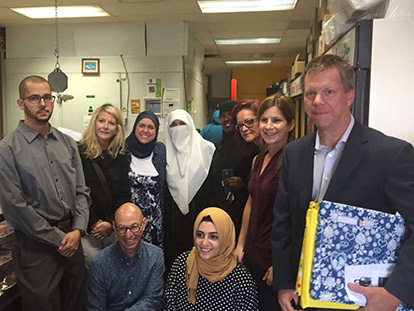 Members of the team that brought a special Eid al Adha to Muslim children in care this year. From left to right: Karim Mekki, Debbie Hoffman, Sawsane El Khatib, Majeda Elghaben, Aaminah Abdulqadir, Marion Bailey-Canham, Cindy Perron, Walter Noble, bottom row André Fontaine,  Ithar Abusheikha
