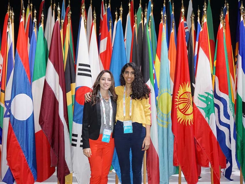 Dhilal Alhaboob (in yellow), with friend Yumun Sisalem, another Canadian Young One World Ambassador from Ottawa.