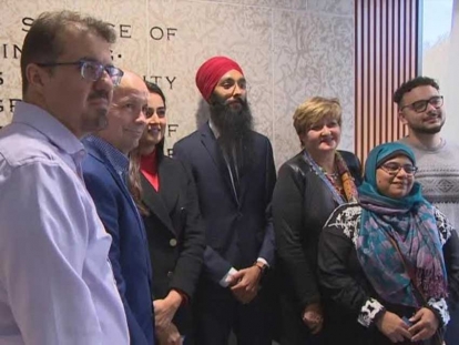 Winnipeg City Councillors Shawn Nason and Janice Lukes, accompanied by members of the Sikh and Muslim community, at Winnipeg City Hall.