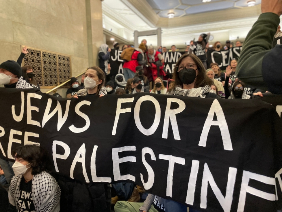 Protesters block the offices of Members of Parliament demanding an arms embargo on Israel.