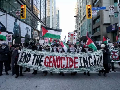 Protesters attend a rally in Toronto in support of Palestinians on Jan. 14, 2024.