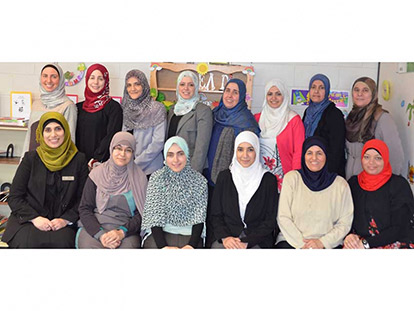 Dina Shalabi with Abraar School Arabic teachers and conference organizers.