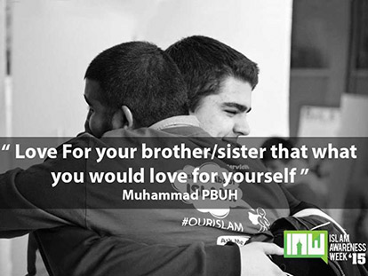 Two students hug at this year&#039;s Islam Awareness Week at Carleton University