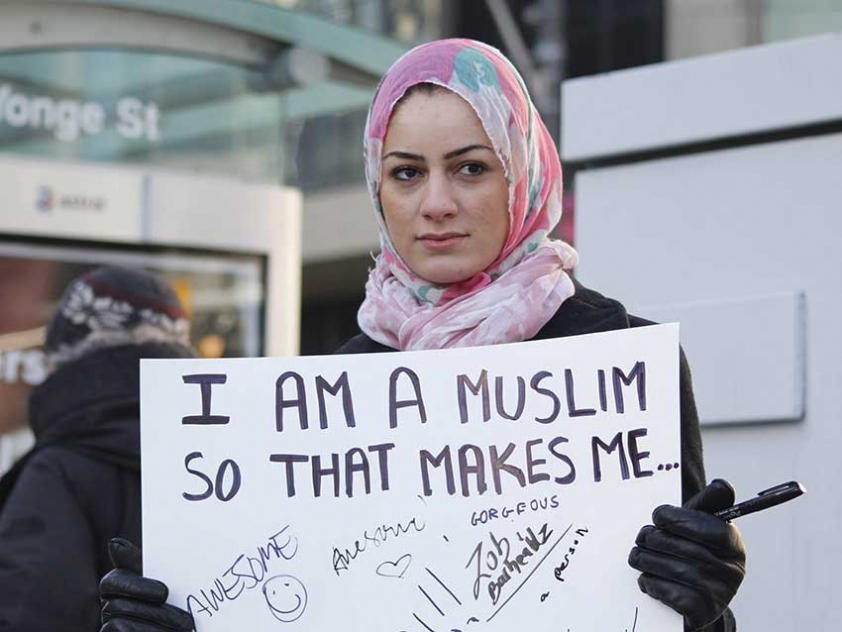 Assma Galuta aka Asoomii Jay on the streets of Toronto during the filming of the video &quot;I Am A Muslim&quot;