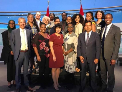 Habon Ali with Canadian Members of Parliament and members of the Public Health Agency of Canada at the launch of the &quot;Mental Health of Black Canadians Fund.&quot;