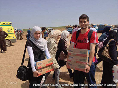 Rama Imadi and Yaman Marwah deliver supplies in Syria.