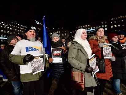 Demonstrators protest the awarding of the 2019 Nobel literature prize to Peter Handke in Stockholm, in December 2019.