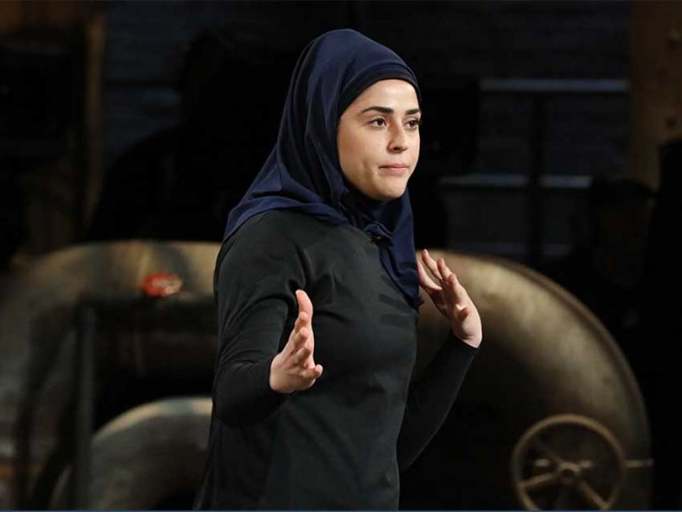 Thawrih co-founder Sarah Abood demonstrates her product, the  &quot;quick release&quot; hijab ideal for members of law enforcement.