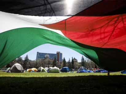Pro-Palestinian protesters with tents seen at The Quad at the University of Manitoba in Winnipeg on May 8, 2024