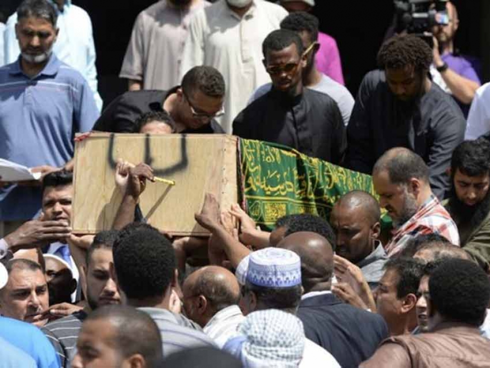 Mourners carry Abdirahman Abdi at his janazah (funeral) at the Ottawa Muslim Association in 2016.