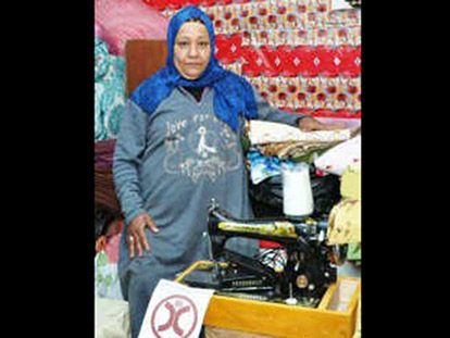Nagah, 65, a beneficiary of Human Concern International&#039;s micro-financing programmes in Egypt. She and her daughter (who is in the final year of high school) previously lived on handouts from the local mosque. Today Nagah is the owner of a sewing business.