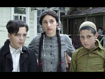 From the film: Saide Arifova with Itzhak, a Jewish orphan she is hiding, and Mustafa, a Tatar boy.