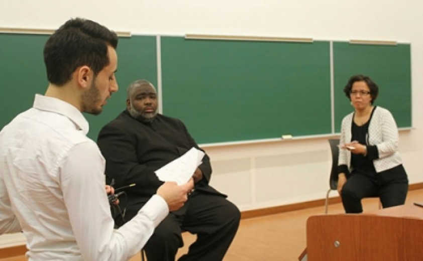 Mouhammed Hallawi, the president of ABSA at the University of Ottawa, moderates the Q &amp; A session with Sheikh Hanif Mohamed and Reverend Bassma Jaballah