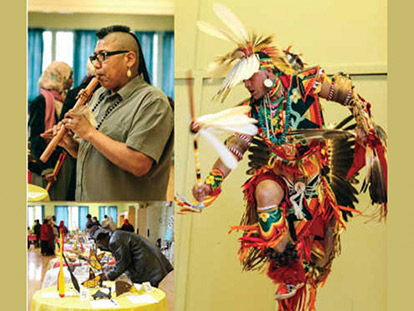 Jason Mullins dances in traditional Cherokee regalia. Mi&#039;kmaq Artist Thomas Clair plays flute. Guests views auction items donated by Aboriginal organizations and artists.