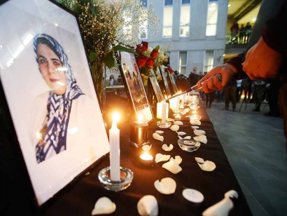 Candles are lit at a vigil organized for the Winnipeg victims killed on Flight PS752.