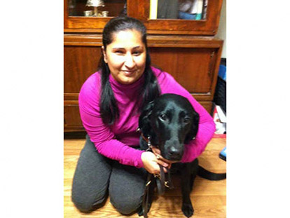 Arshina Kassam with her seeing-eye dog Kiki