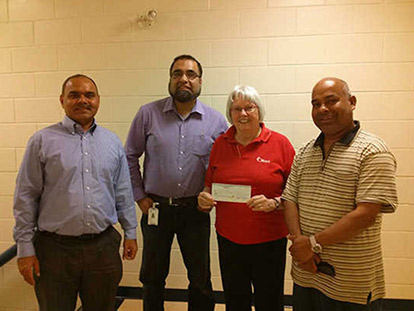 KMA Members presenting City Councillor Marianne Wilkinson with $2500 cheque