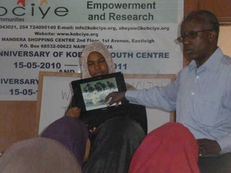 The author&#039;s sister Kaltum, and their late father, Abdullahi Hassan Eyow, at a workshop last summer.
