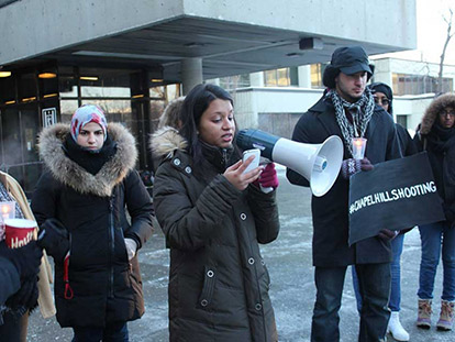 Tabitha Mirza speaking at the University of Ottawa Vigil for the victims of the Chapel Hill Shooting.