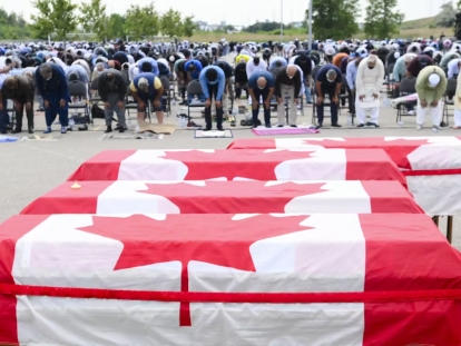 Thousands pray at the funeral service for the four victims of the deadly vehicle attack on members of the Canadian Muslim community in London, Ont., in June 2021. The man orginally charged with murder in the case had the charges upgraded to terrorism and was convicted. 
