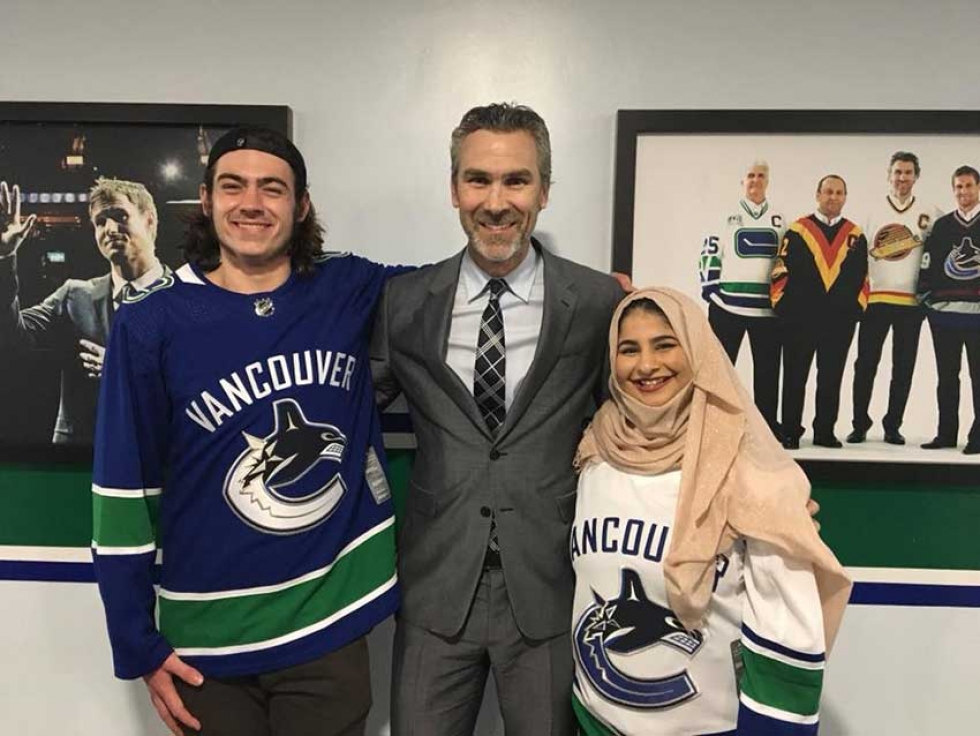 The Vancouver Canucks show their appreciation for Jake Taylor and Noor Fadel in their fight against Islamophobia. This photo was taken with retired professional hockey player Trevor Linden, the current president of hockey operations of the Vancouver Canucks, 