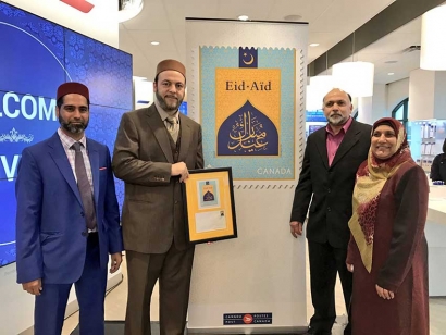 Imam Hamid Slimi and Muslim community members at the launch of Canada Post&#039;s Eid Stamp in Richmond Hill, Ontario.