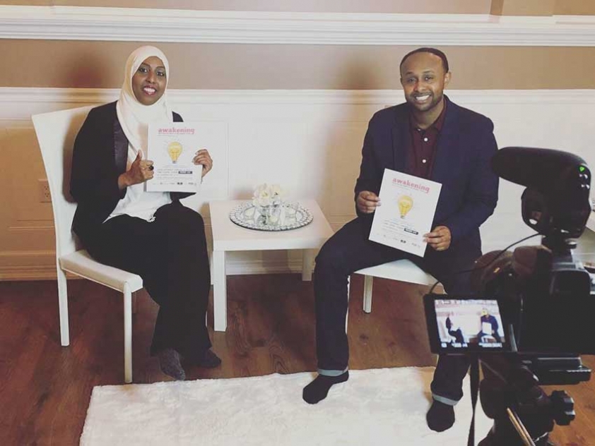 Sharmaarke Abdullahi and Ifraah Hassan shooting the 5th Annual Awakening Conference promo video.