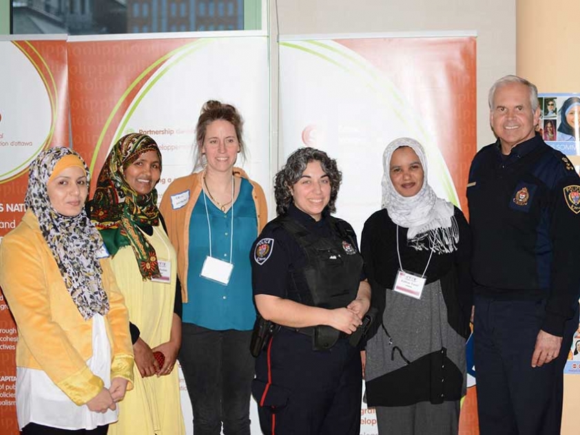 Afghan women&#039;s rights activist Sadiqa Basiri (far left) spoke at Ottawa Hijab Solidarity Day along with with Ottawa Police Chief Charles Bordeleau.
