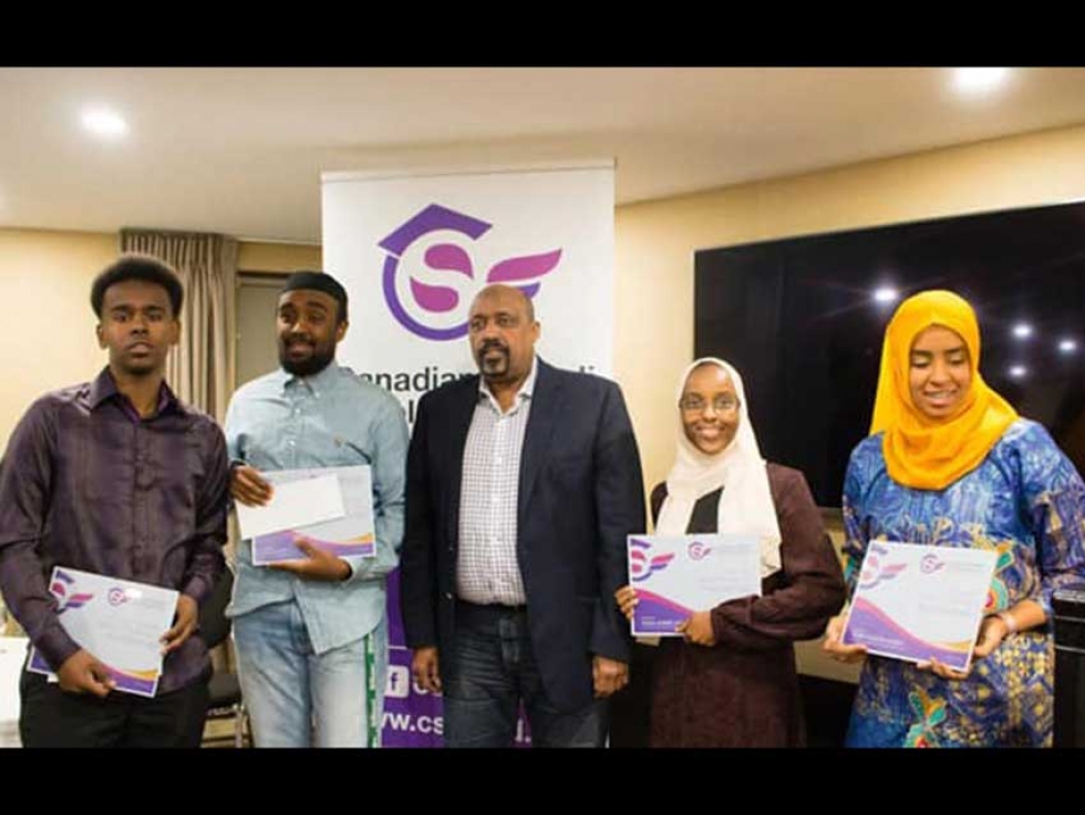 Members of the Canadian Somali Scholarship Fund board and scholarship recipients in Ottawa in March, 2019.