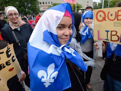 Demonstrators take part in a protest against Quebec’s proposed Values Charter in Montreal in September 2013.