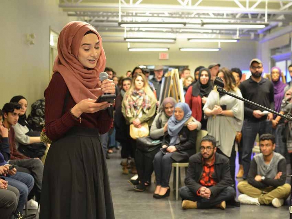 Spoken word poet Maha Malik performing at the annual Muslim Art Movement event organized by the Western Muslim Initiative in Calgary, Alberta.