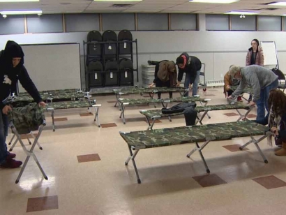 Volunteers set up the overnight space at Al Rashid Mosque in Edmonton, Alberta