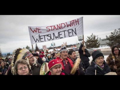 Hereditary Chief Ronnie West, centre, from the Lake Babine First Nation, sings and beats a drum during a solidarity march after Indigenous nations and supporters gathered for a meeting to show support for the Wet&#039;suwet&#039;en Nation, in Smithers, B.C., on Jan. 16, 2019.